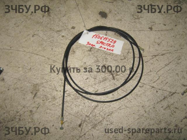 KIA Spectra Трос лючка бензобака