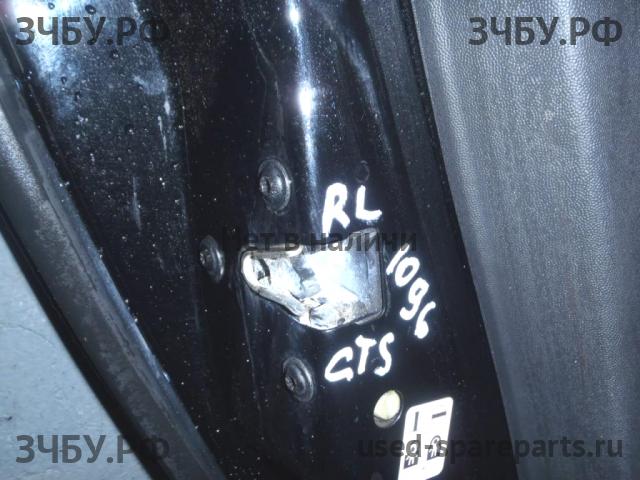 Cadillac CTS (1) Замок двери задней левой