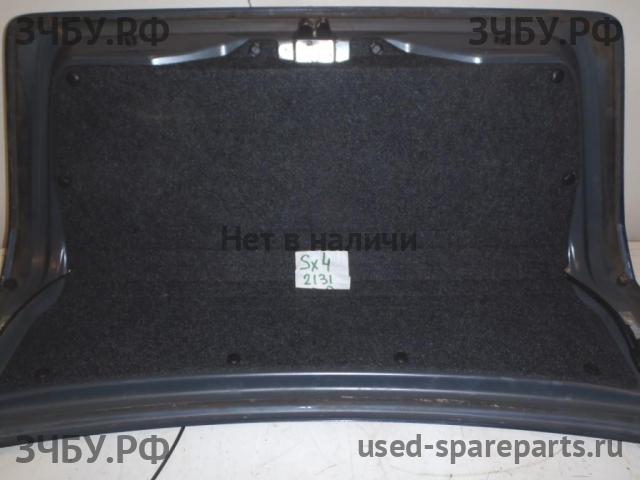 Suzuki SX4 (1) Обшивка крышки багажника