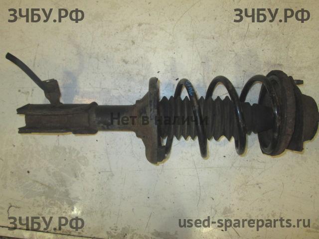Mazda 323 [BA] Стойка передняя левая (в сборе)