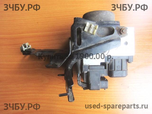 Nissan Primera P12 Блок ABS (насос)