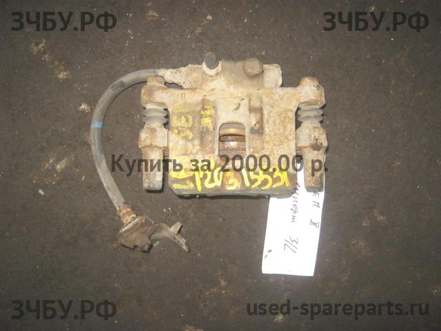 Mitsubishi Lancer 10 [CX/CY] Суппорт задний левый (в сборе со скобой)