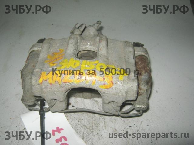 Mazda 3 [BK] Суппорт задний левый (в сборе со скобой)