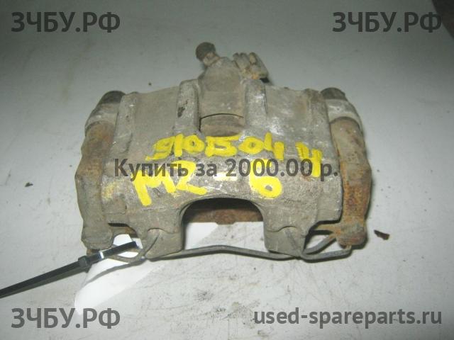Mazda 3 [BK] Суппорт задний правый (в сборе со скобой)