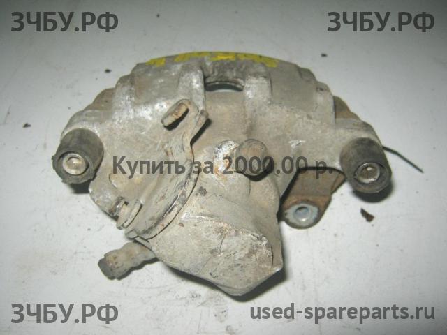 Mazda 3 [BK] Суппорт задний правый (в сборе со скобой)