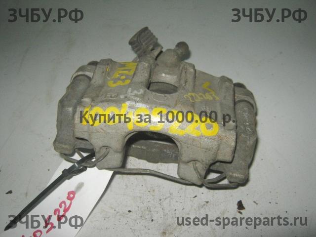 Mazda 3 [BK] Суппорт задний левый (в сборе со скобой)