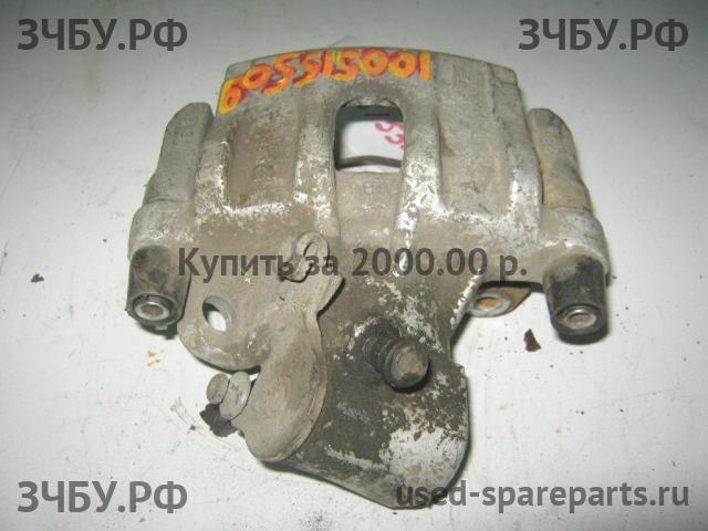 Mazda 3 [BK] Суппорт задний правый (в сборе со скобой)
