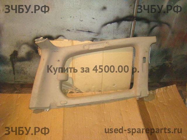 Toyota Land Cruiser 100 Обшивка багажника боковая левая