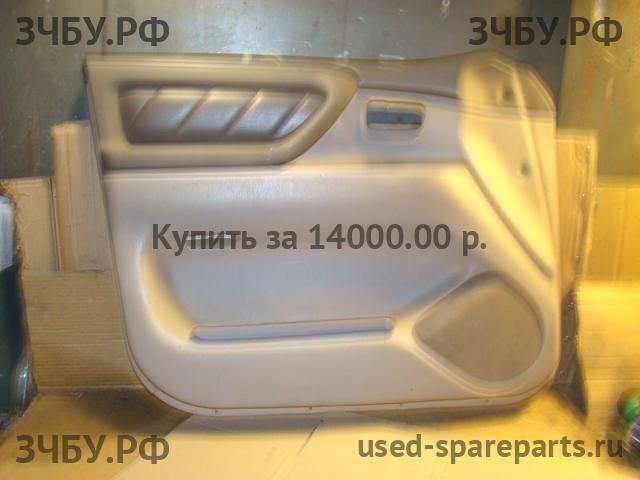 Toyota Land Cruiser 100 Обшивка двери передней левой