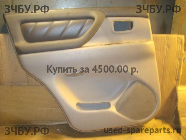 Toyota Land Cruiser 100 Обшивка двери задней левой