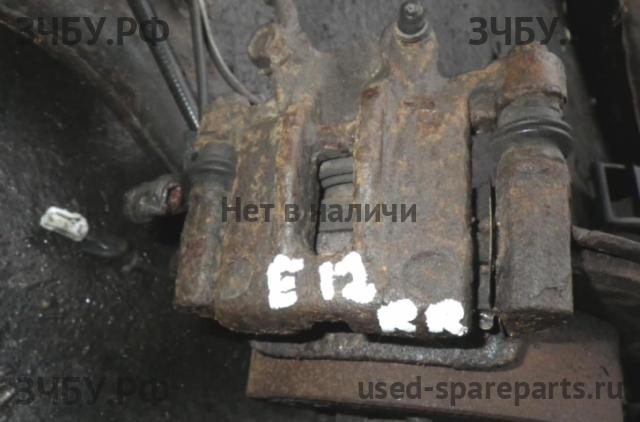 Toyota Corolla (E12) Суппорт задний правый (в сборе со скобой)