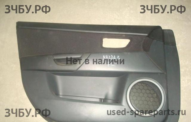 Mazda 3 [BK] Обшивка двери передней левой