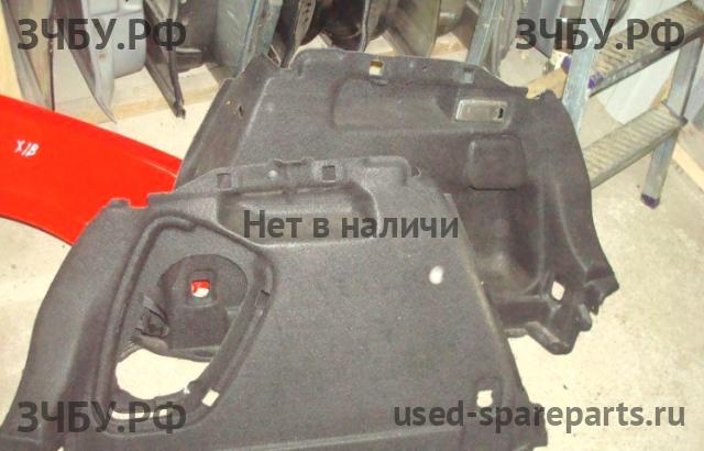 Mazda 3 [BK] Обшивка багажника боковая правая