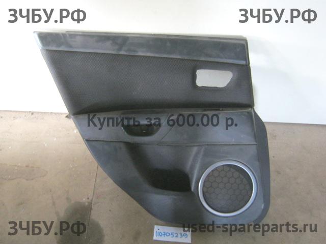Mazda 3 [BK] Обшивка двери задней левой