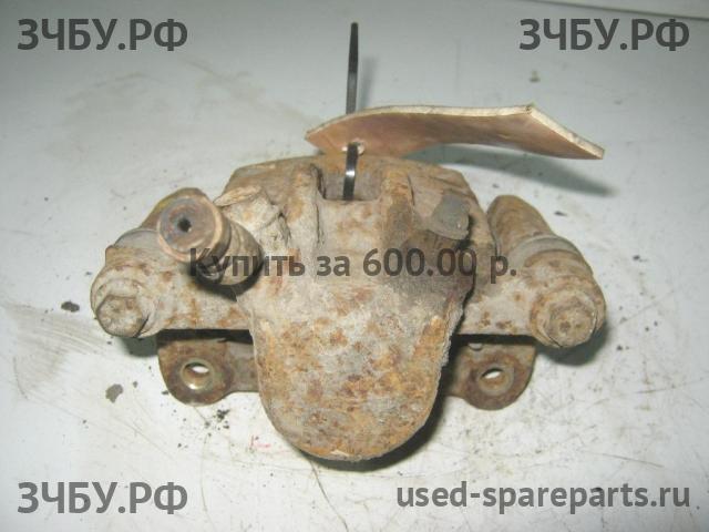 Toyota Corolla (E12) Суппорт задний правый (в сборе со скобой)