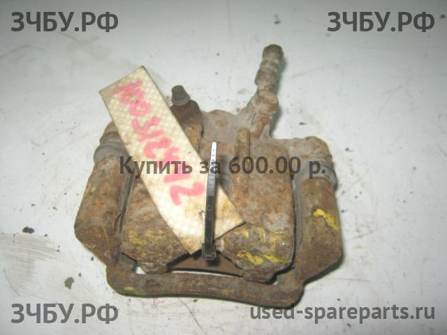 Toyota Corolla (E12) Суппорт задний правый (в сборе со скобой)