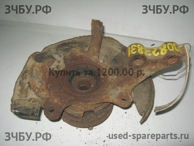 Toyota Carina.E (T190) Кулак поворотный передний левый (со ступицей)