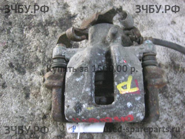 Toyota Auris 1 (E150) Суппорт задний правый (в сборе со скобой)
