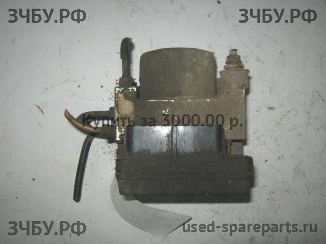 Mazda 323 [BJ] Блок ABS (насос)