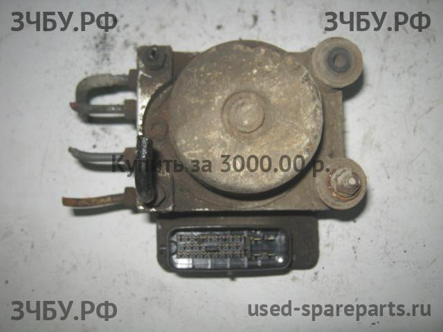 Mazda 323 [BJ] Блок ABS (насос)