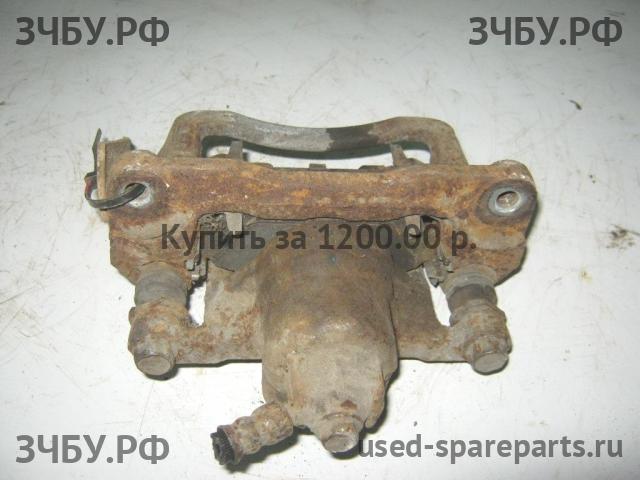 Subaru Impreza 2 (G11) Суппорт задний левый (в сборе со скобой)