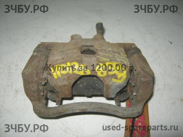 Subaru Impreza 2 (G11) Суппорт задний правый (в сборе со скобой)