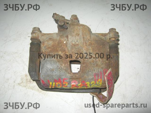 Nissan Almera Classic Суппорт передний правый (в сборе со скобой)