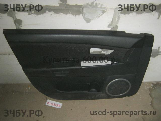 Mazda 3 [BK] Обшивка двери передней левой