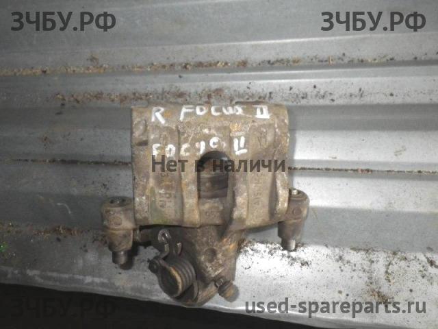 Ford Focus 2 Суппорт задний правый (в сборе со скобой)