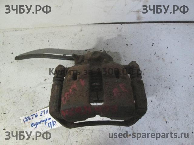 Mitsubishi Colt 6 (Z30) Суппорт передний правый (в сборе со скобой)
