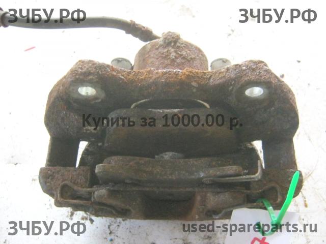 Mitsubishi Colt 6 (Z30) Суппорт передний левый (в сборе со скобой)