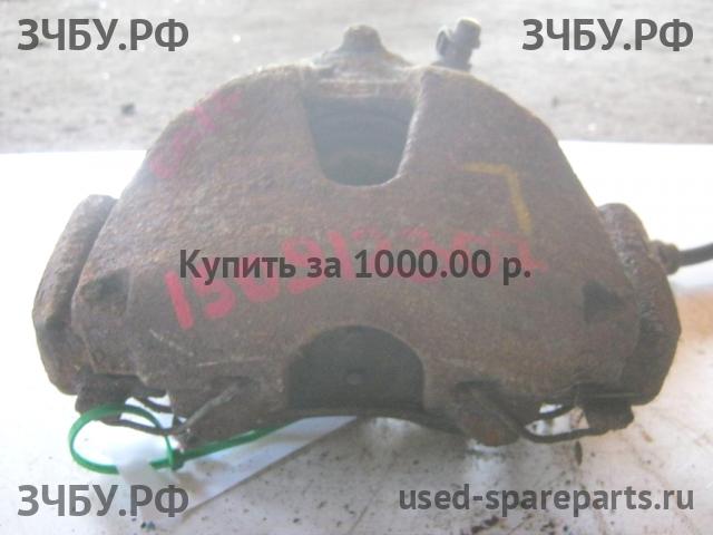 Mitsubishi Colt 6 (Z30) Суппорт передний левый (в сборе со скобой)