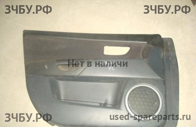 Mazda 3 [BK] Обшивка двери передней левой