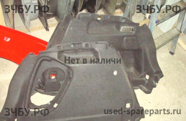 Mazda 3 [BK] Обшивка багажника боковая правая