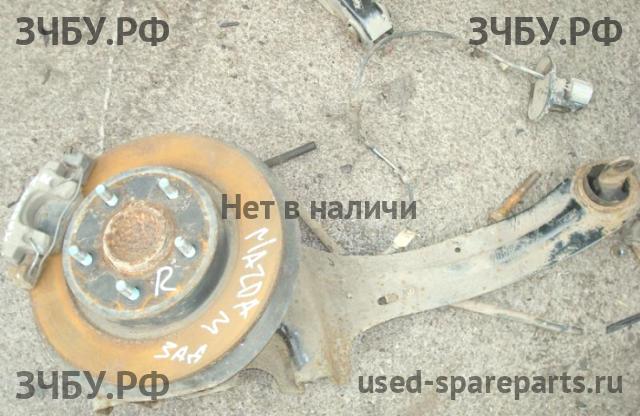 Mazda 3 [BK] Суппорт задний правый (в сборе со скобой)