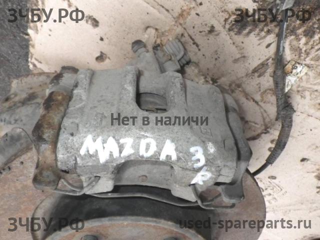 Mazda 3 [BK] Суппорт задний правый (в сборе со скобой)