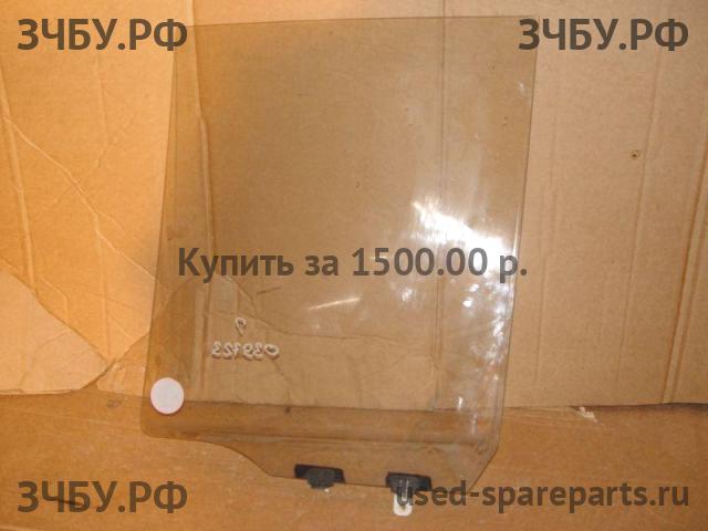 Nissan Navara 1 (D40) Стекло двери задней левой