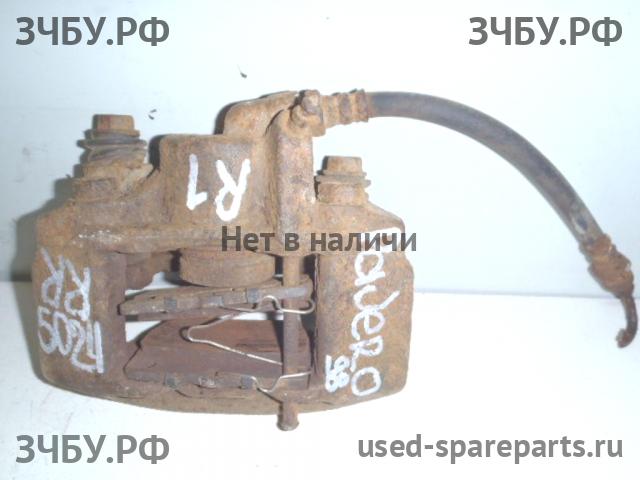 Mitsubishi Pajero/Montero Sport 1 (K9) Суппорт задний правый (в сборе со скобой)