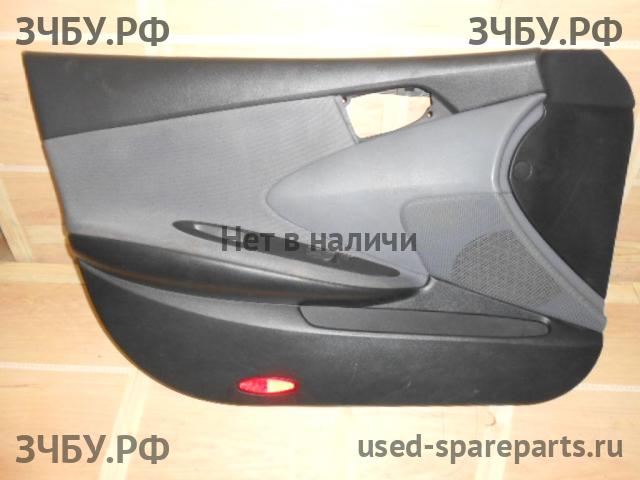 Nissan Primera P12 Обшивка двери передней левой