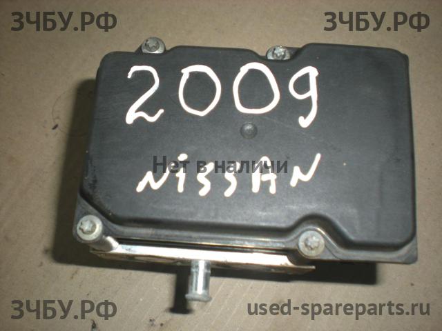 Nissan Primera P12 Блок ABS (насос)