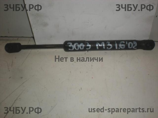 Mazda 3 [BK] Амортизатор крышки багажника