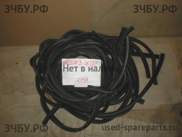 Mazda 3 [BK] Уплотнитель двери