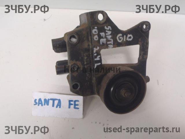 Hyundai Santa Fe 1 (SM) Кронштейн ролика натяжения ремня