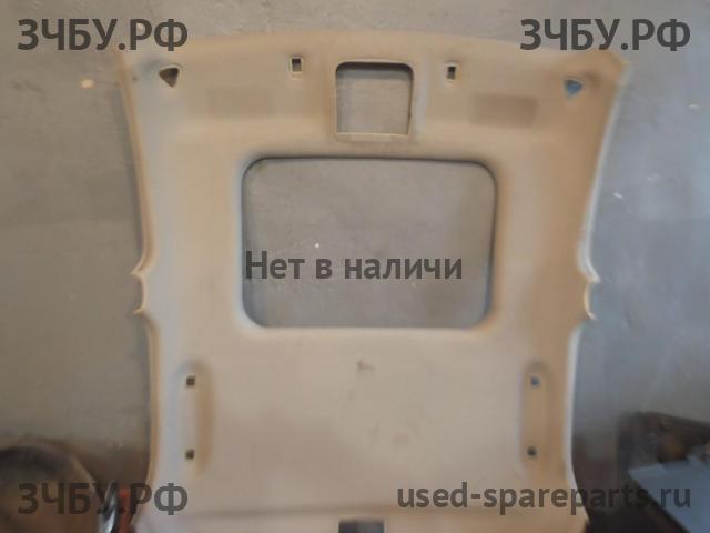 Cadillac CTS (1) Обшивка потолка