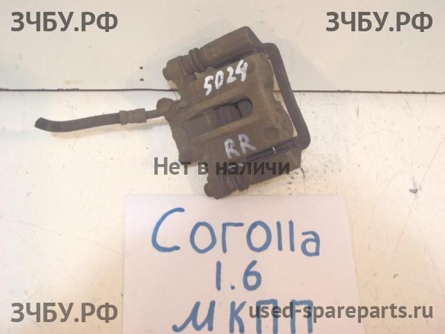 Toyota Corolla (E12) Суппорт задний правый (в сборе со скобой)