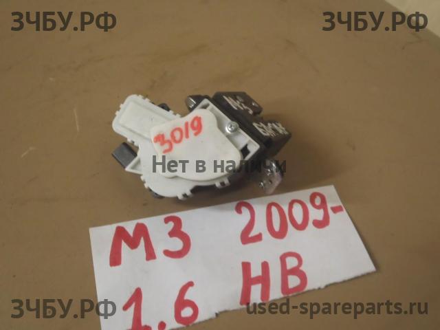 Mazda 3 [BL] Замок багажника