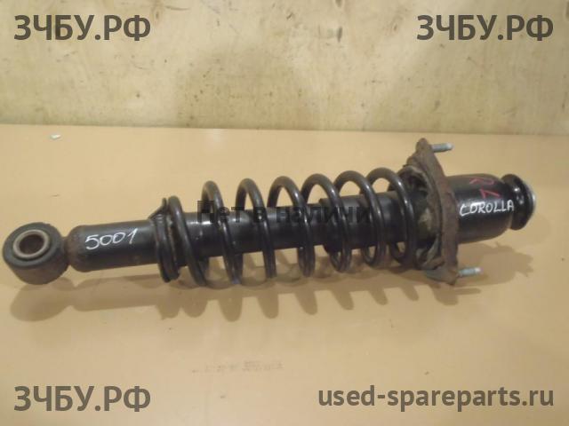 Toyota Corolla (E12) Стойка задняя левая (в сборе)