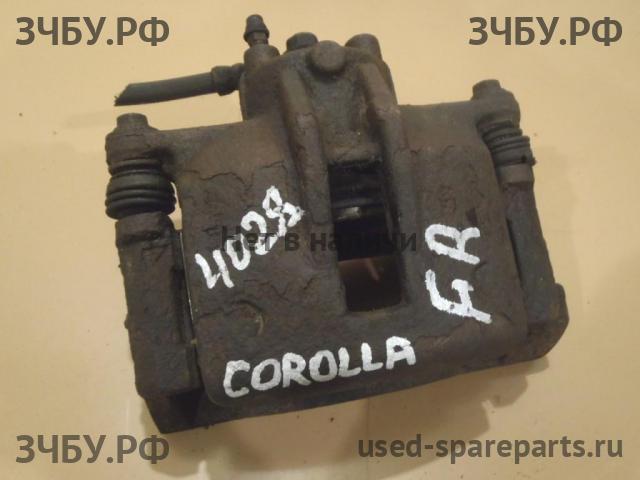 Toyota Corolla (E12) Суппорт передний правый (в сборе со скобой)