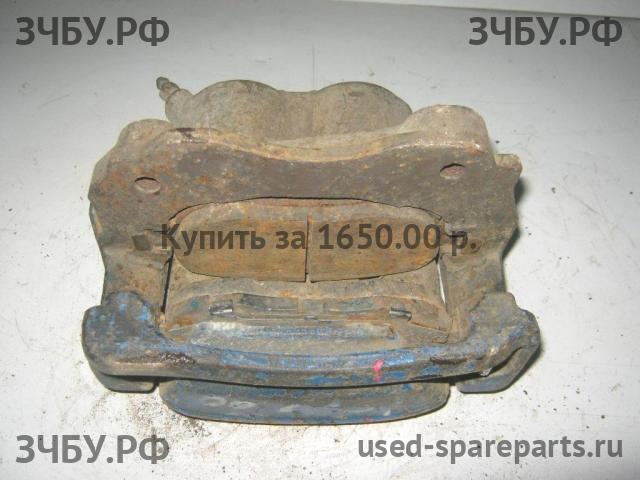 Lexus IS (1) 200/300 Суппорт передний правый (в сборе со скобой)