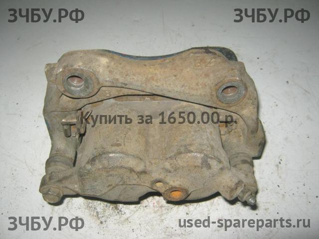 Lexus IS (1) 200/300 Суппорт передний правый (в сборе со скобой)